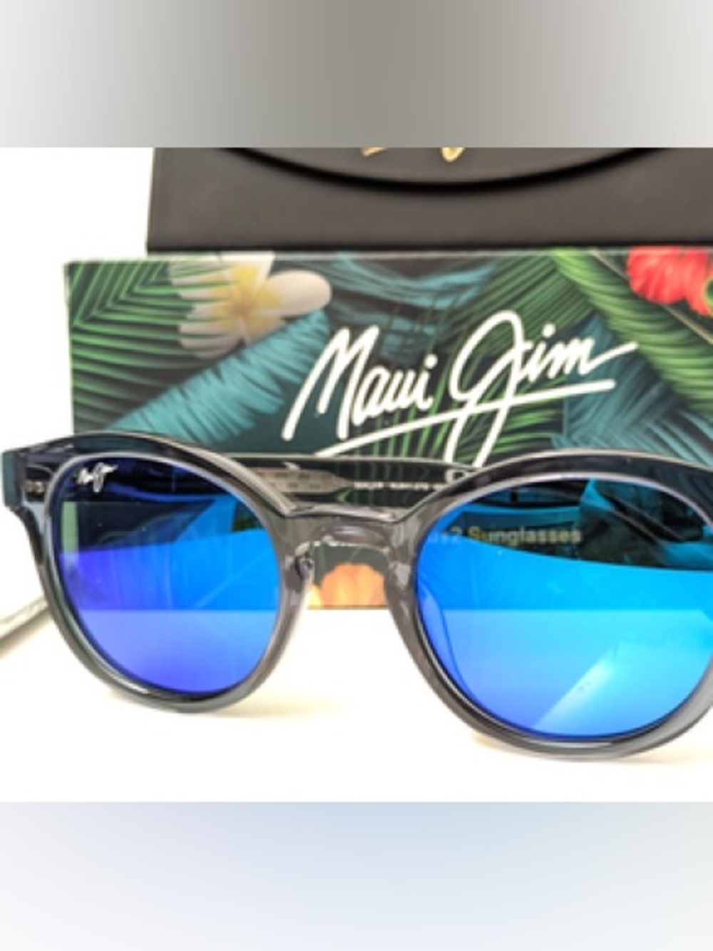 Maui Jim Round Sunglasses with Blue Mirror Lenses and Translucent Dark Frames